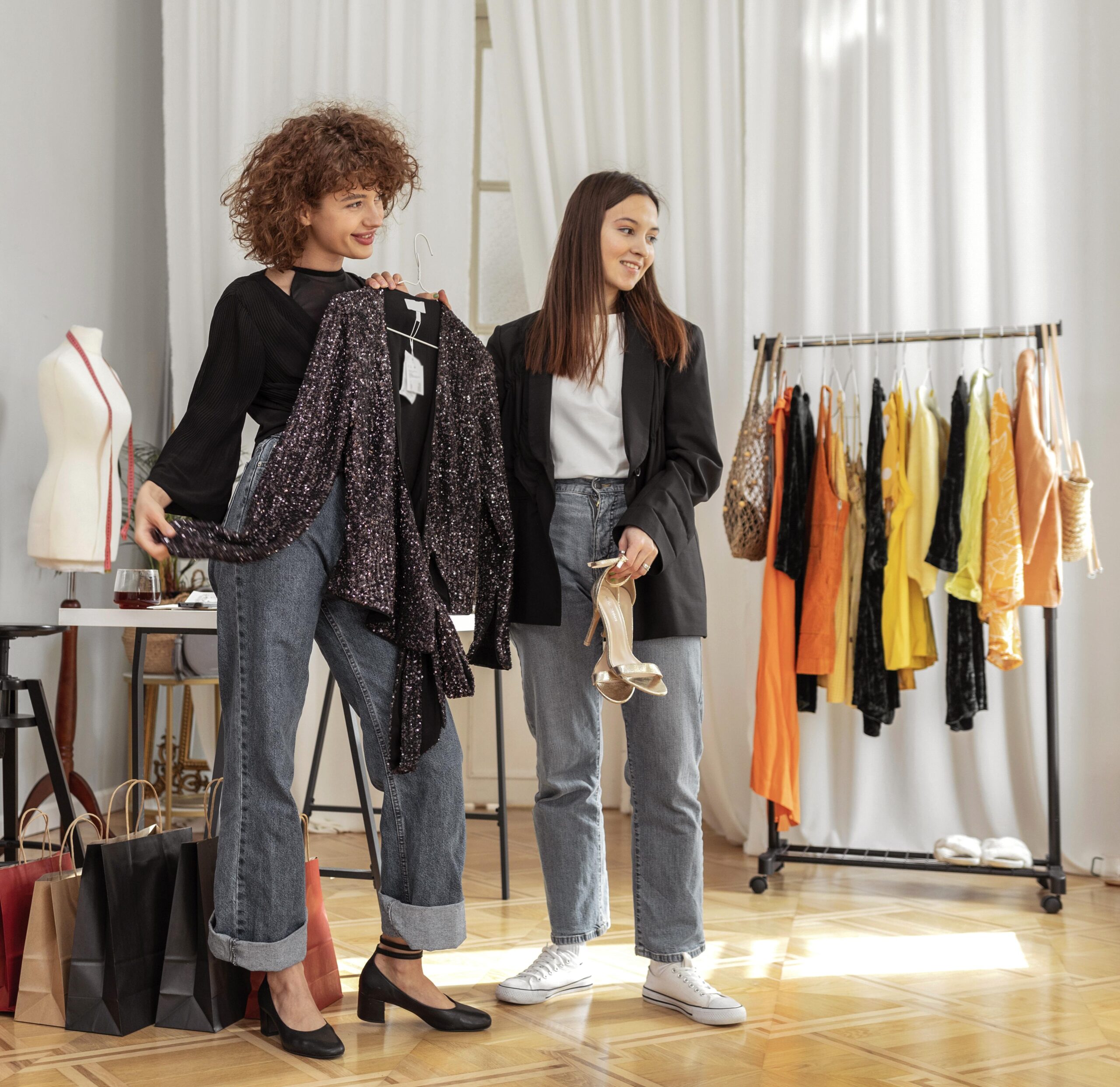 women trying clothes store